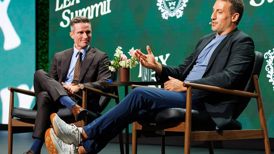 Speakers on the LEX Summit stage