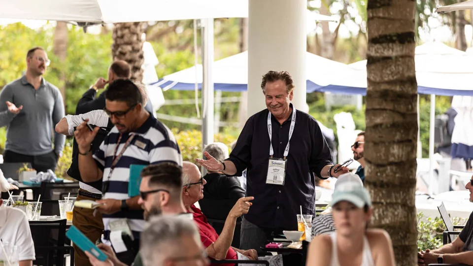 Trial Lawyers Summit attendees gathering at an outdoor reception